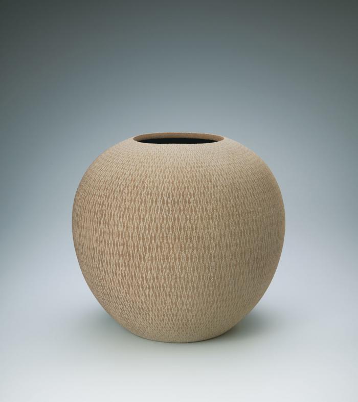 彩泥粒穴干渉文壺